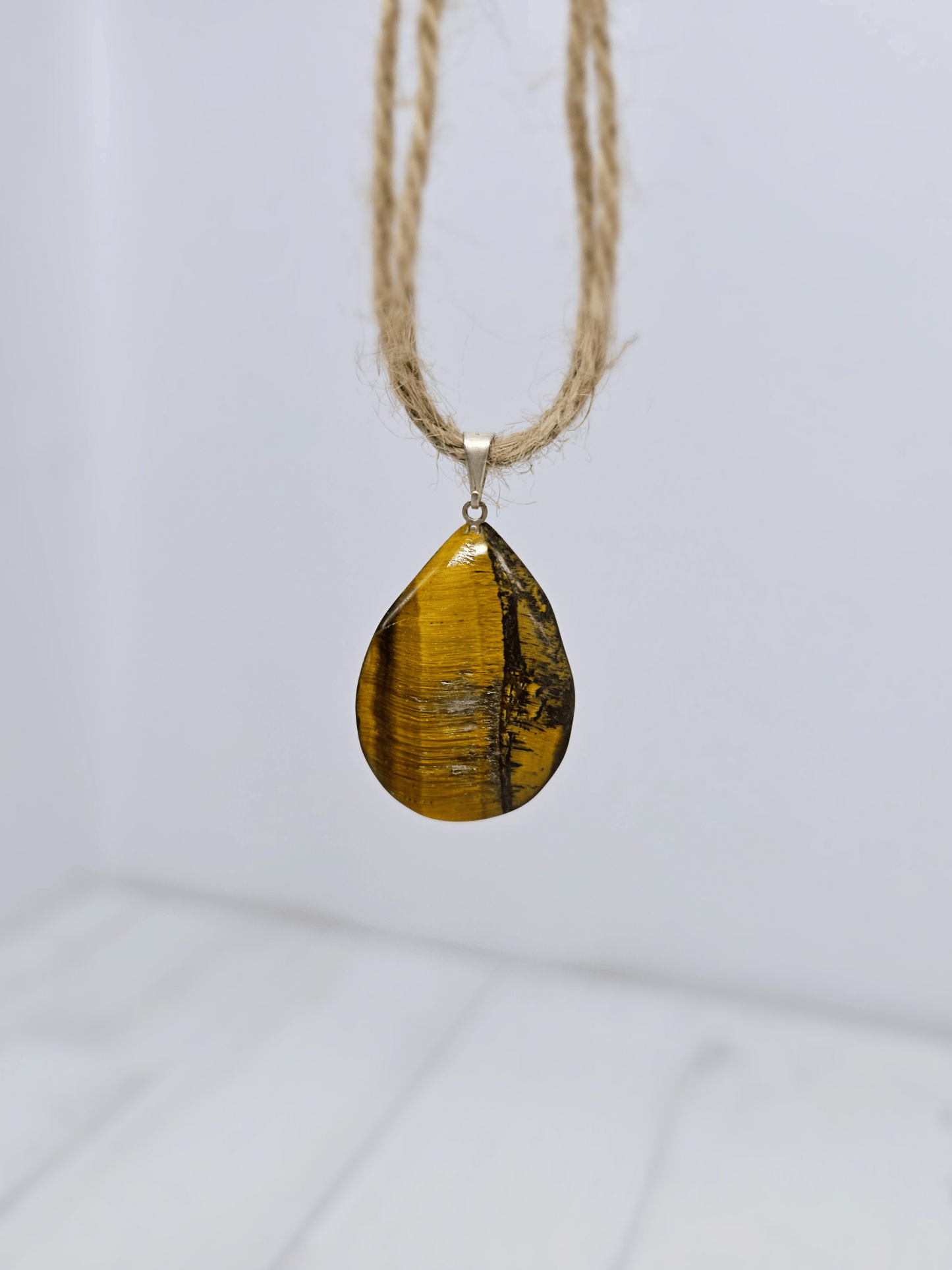 Colgante de Ojo de Tigre en forma de gota | protección y confianza