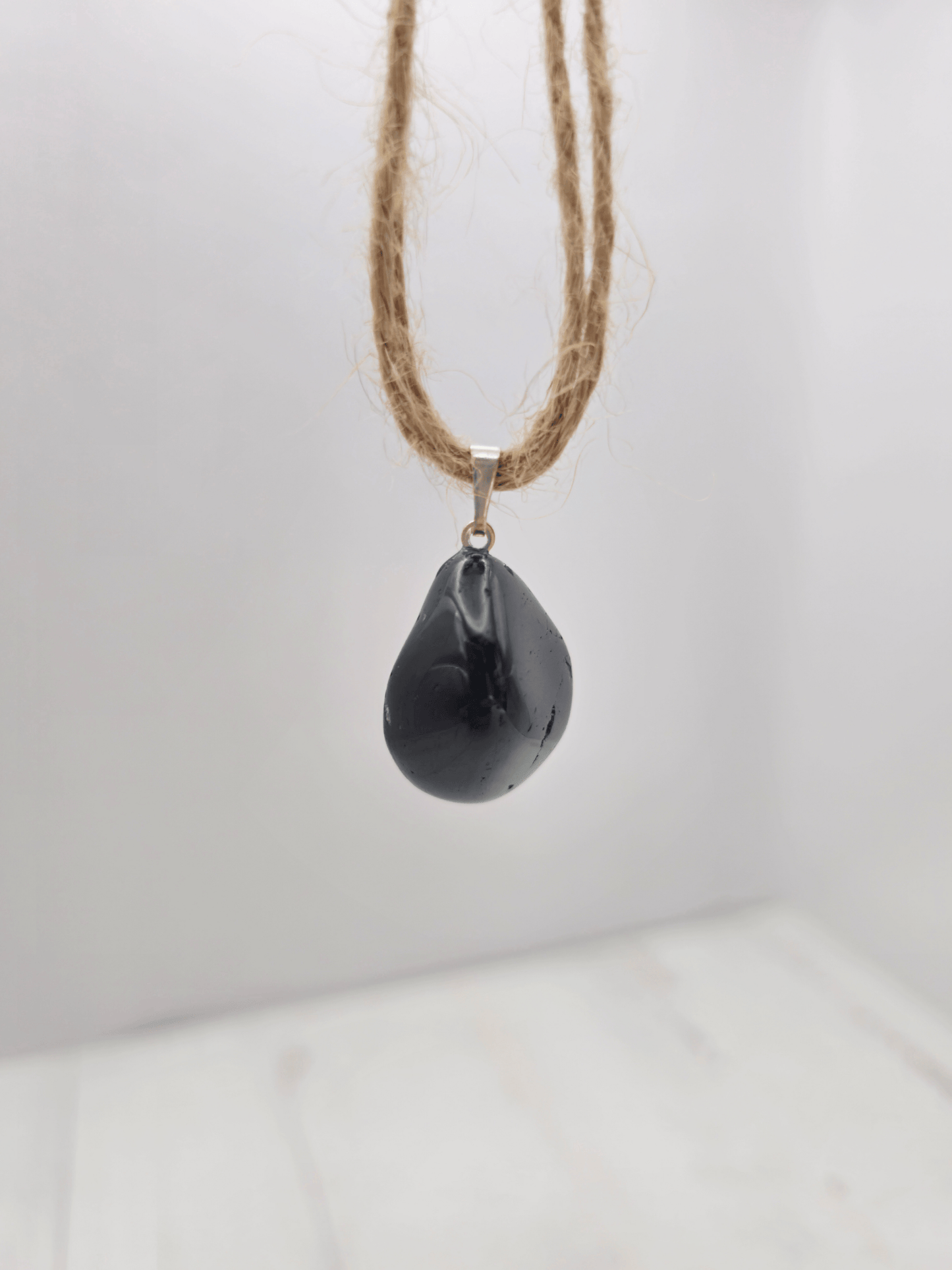Colgante de Turmalina Negra Rodada AB
