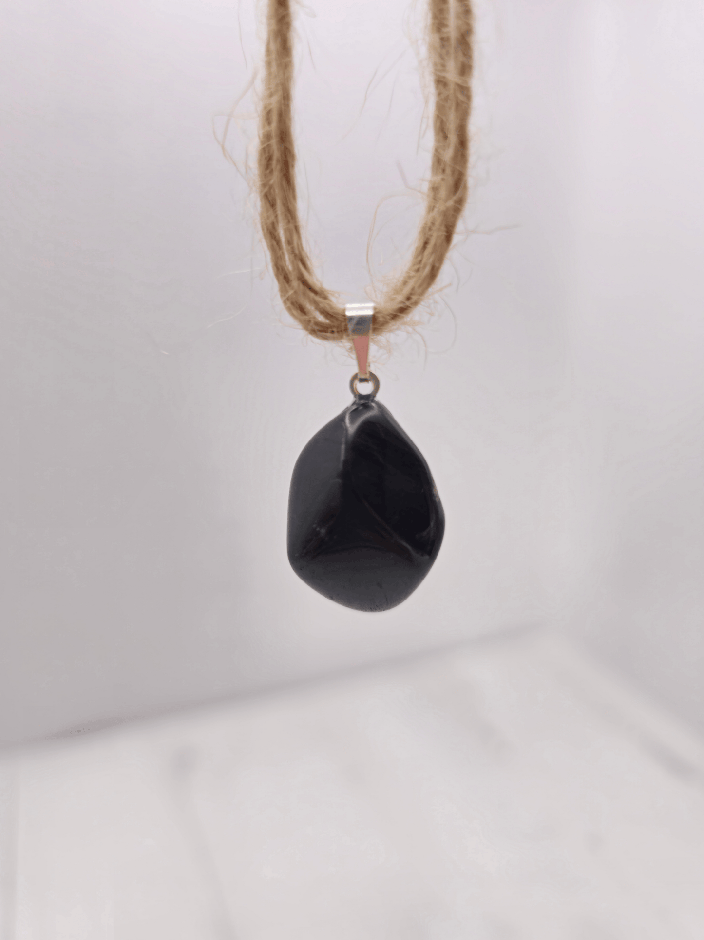 Colgante de Turmalina Negra Rodada AB