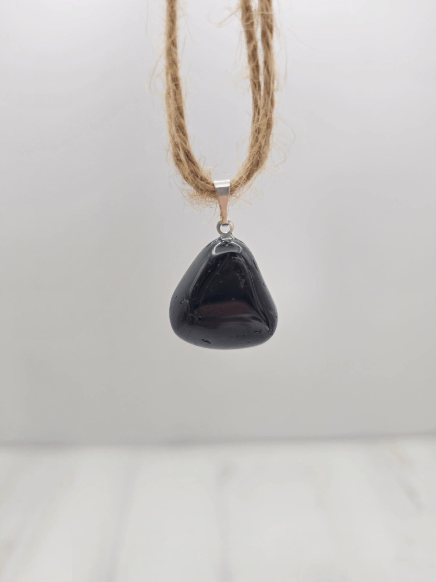 Colgante de Turmalina Negra Rodada AB