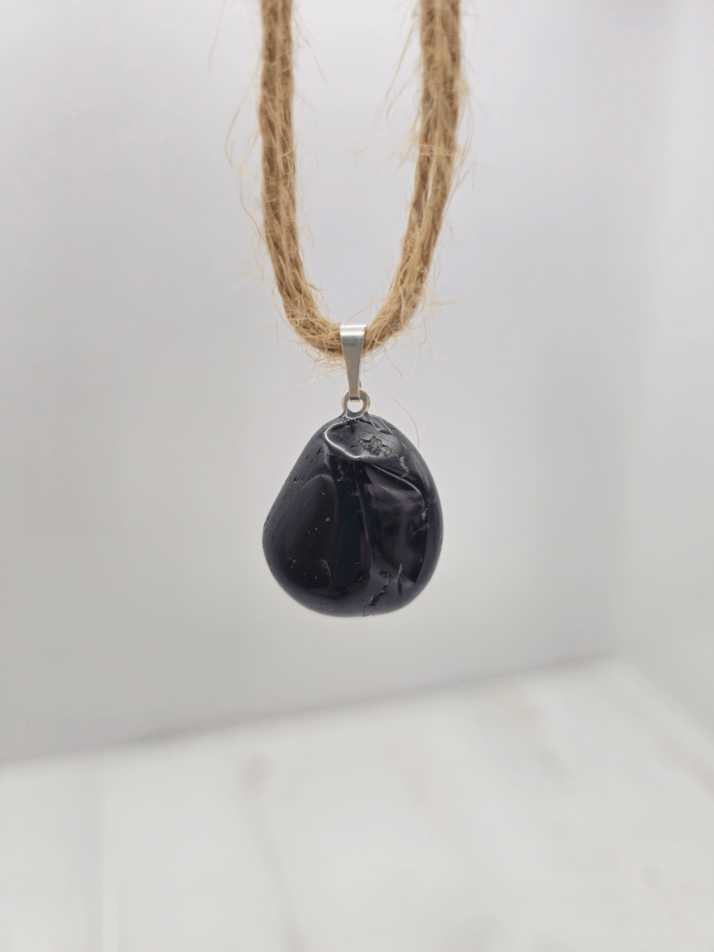 Colgante de Turmalina Negra Rodada AB