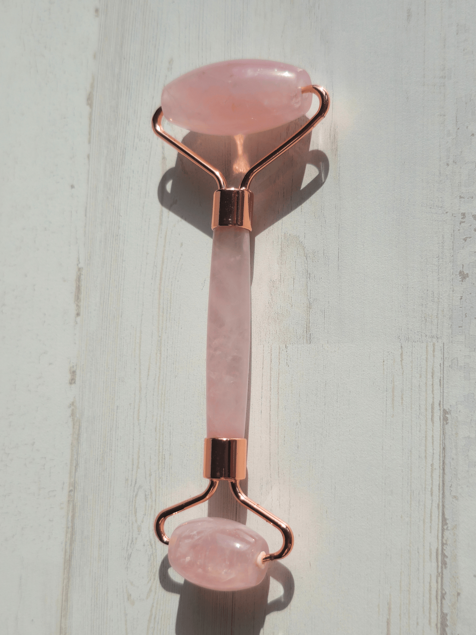 Doble rodillo facial de cuarzo rosa