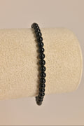 Pulsera de turmalina negra bola 4 mm | Protección energética y enraizamiento.