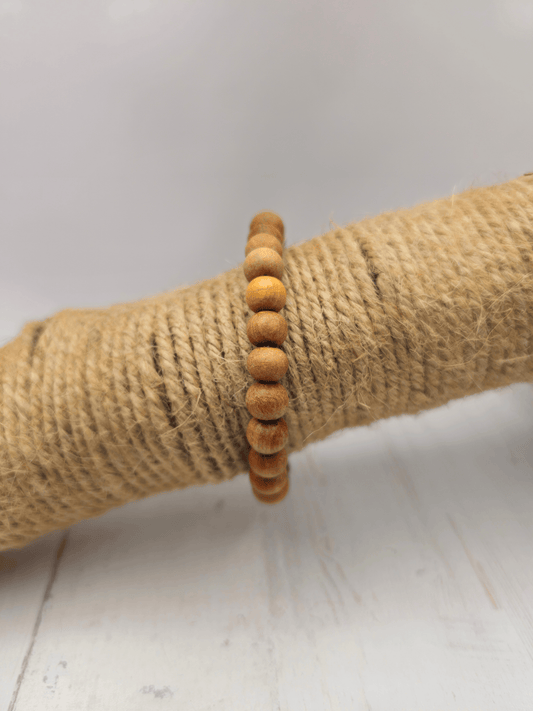Pulsera elástica de madera de sándalo natural con cuentas de 6 mm, 16–18 cm, ideal para meditación, equilibrio y conexión espiritual.