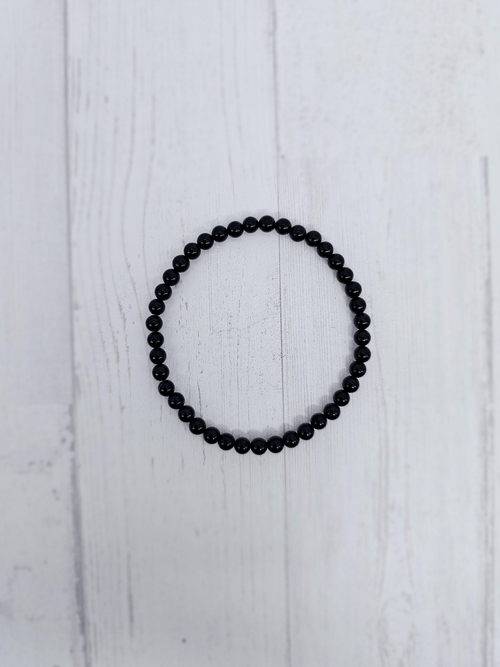 Pulsera de turmalina negra bola 4 mm | Protección energética y enraizamiento.