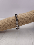 Pulsera barroca de turmalina negra y cuarzo roca en hilo elástico, ideal para protección y claridad emocional.