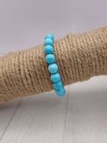 Pulsera de turquenita con bolas de 8 mm (howlita teñida) en hilo elástico, diseño elegante en tonos azules