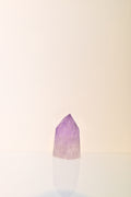 Punta de amatista pulida en tono violeta