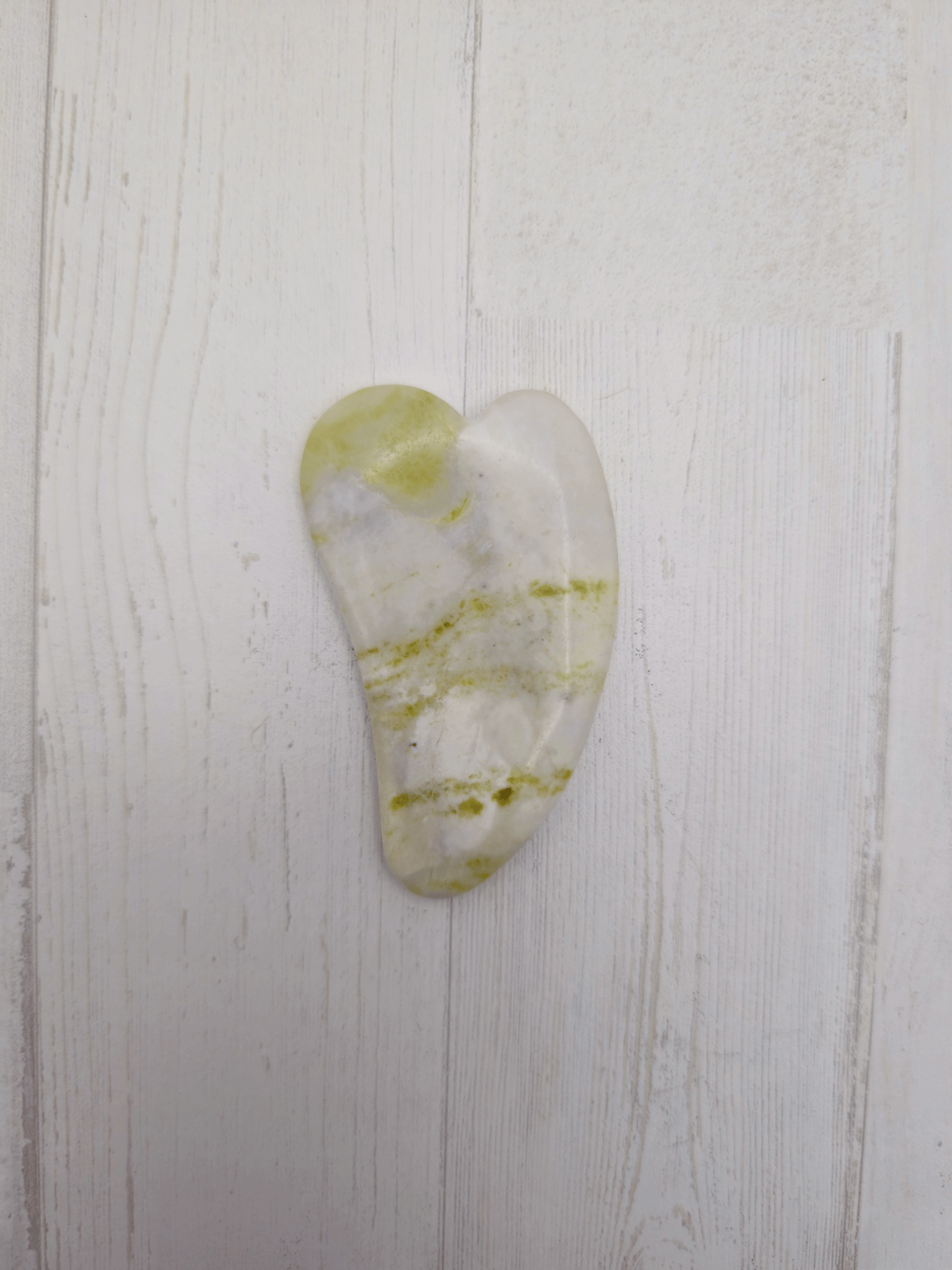 Masajeador gua sha de jade
